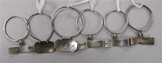 Six George III and later silver neck ring sauce labels;